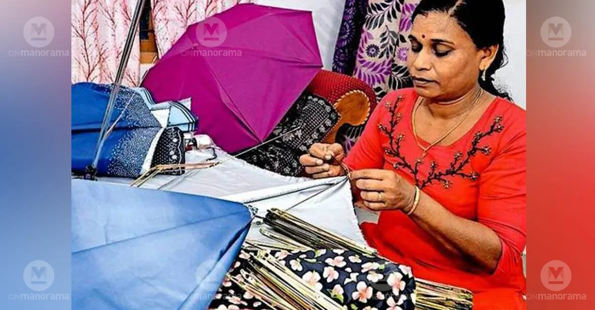 P S Sushama Rajesh of the Pournami Kudumbashree unit at Velloor crafting umbrellas by hand. Photo: Special arrangement