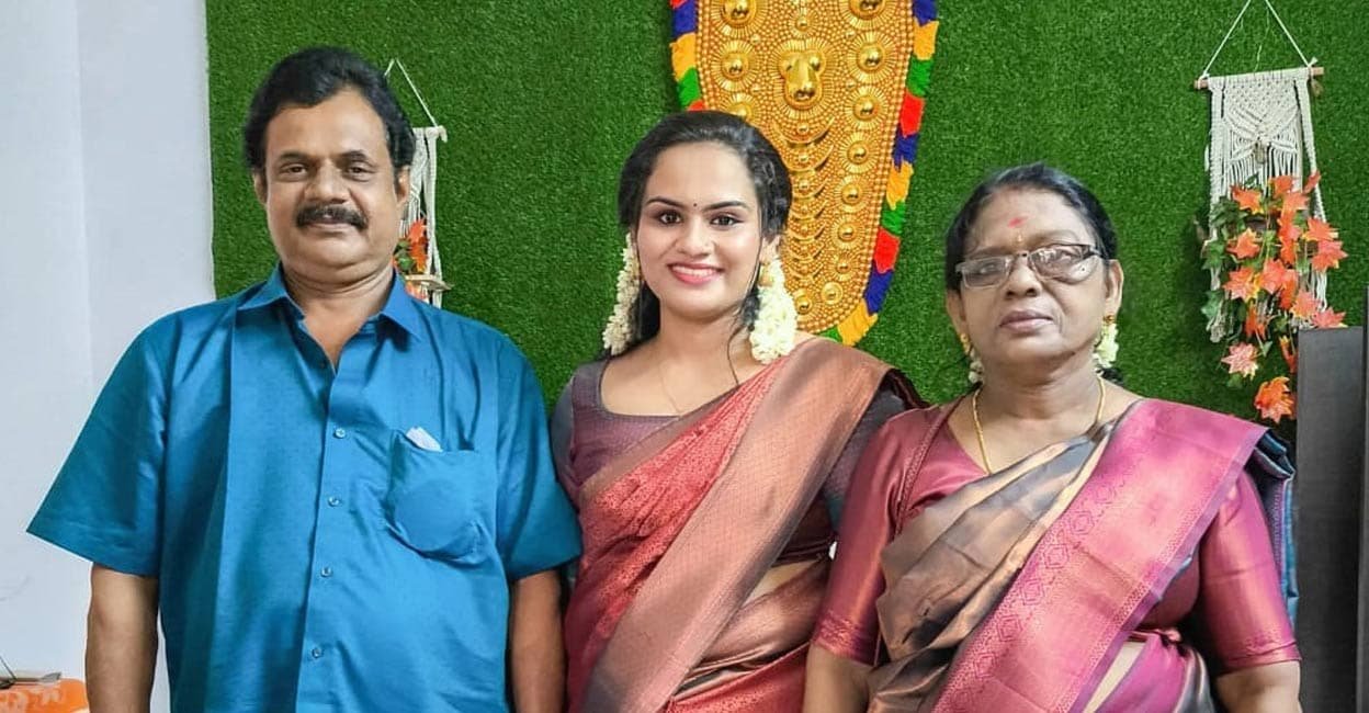 Punya with her parents, Mohanakumar and Jayakumari. Photo: Special Arrangement.