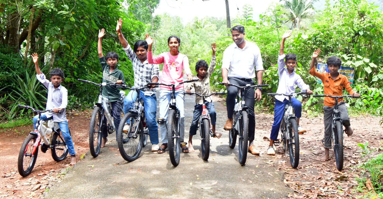 Kasaragod Collector keeps his word, gifts 18 cycles to children of Kannankol tribal settlement | Kerala News | ACTPnews